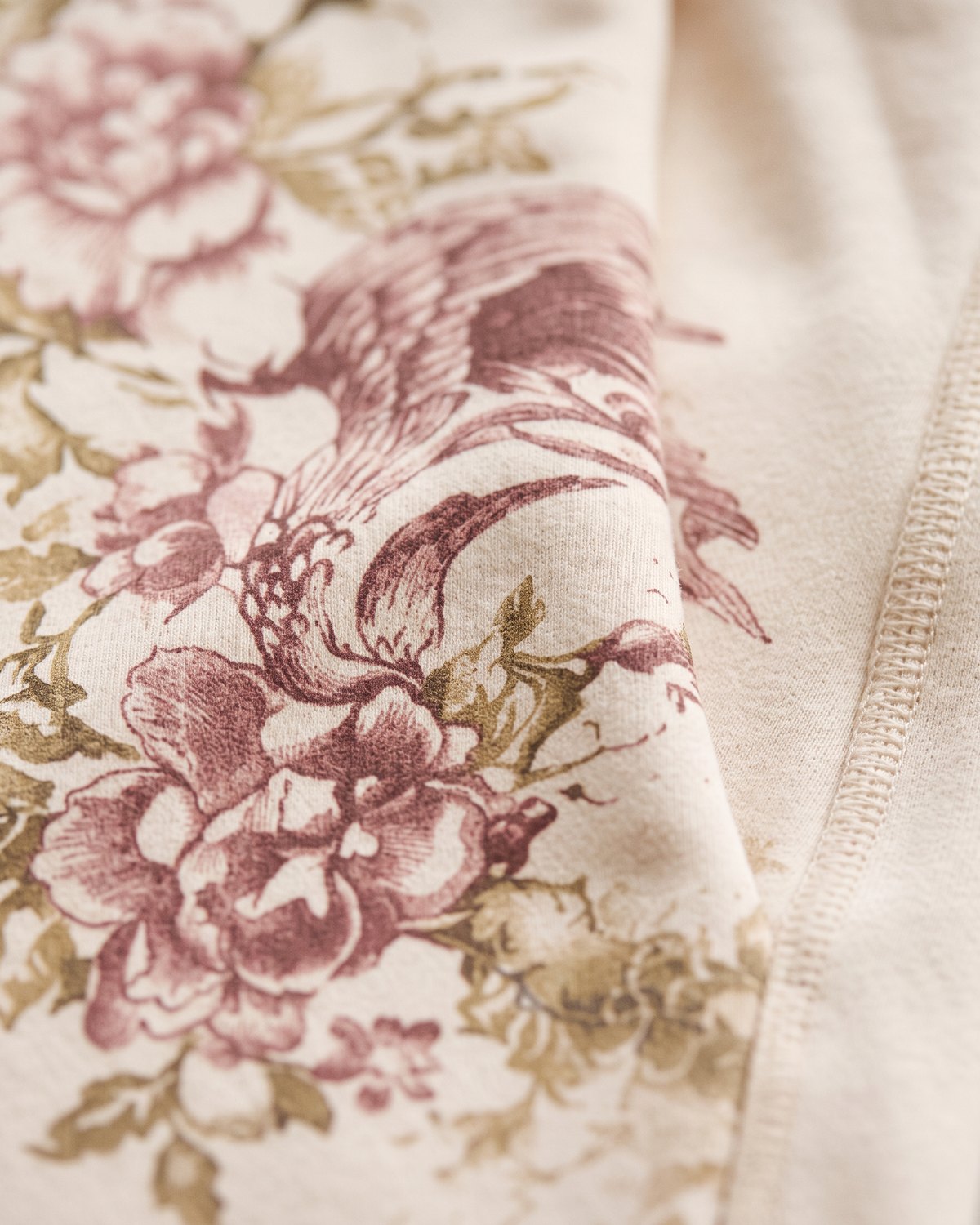 Macro Close-Up of the botanical print and drawcord waistband on Seabreeze Baggy Jeans