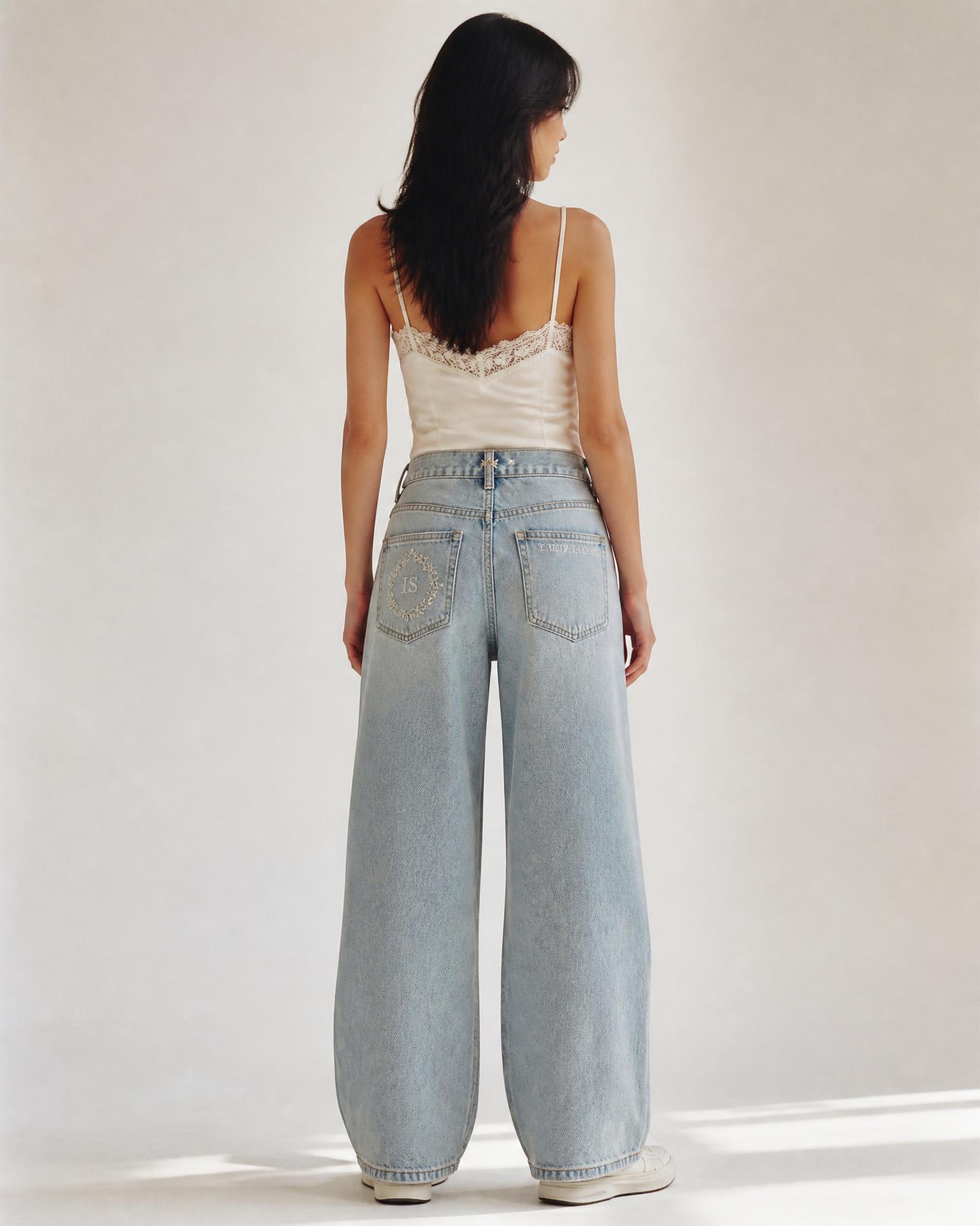 Model Wearing Shellwash Baggy Jeans by Ivoryshores — Back View